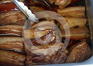 Pork Bellies in a stainless steel tin