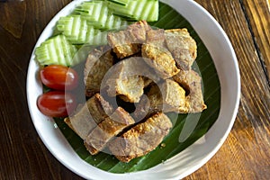 Pork belly fried on a plate