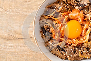 Pork bulgogi rice bowl with kimchi and Korean pickled egg