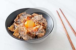 Pork bulgogi rice bowl with kimchi and Korean pickled egg