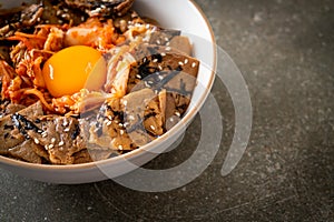 Pork bulgogi rice bowl with kimchi and Korean pickled egg