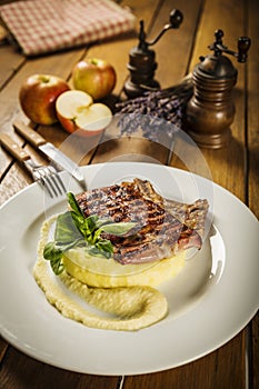 Pork chop with apple pure and potato mash