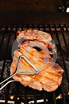 A Pork Chop on the grill