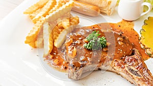 Pork Chop steak on a white plate