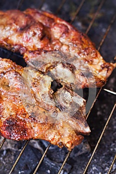 Pork chops on a grill