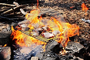 A pork chops steak flame broiled on a barbecue