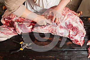 Pork cutting carcasses. Closeup of farm retail.
