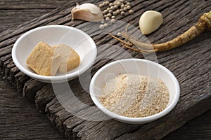 Pork flavor Seasoning Powder and bouillon stock broth cubes in a bowl