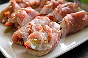 Pork ham rolls with cucumber, paprika, homemade