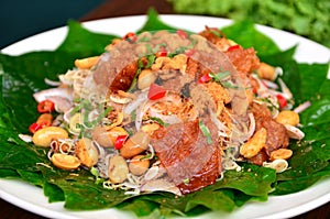 Pork with herb leaves