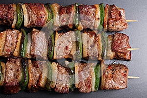 Pork kebabs on wooden skewers