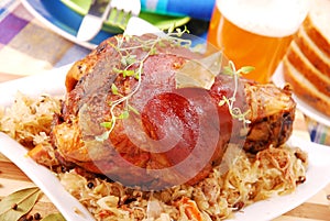 Pork knuckle baked with beer photo