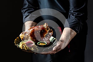 Pork knuckle baked with beer and sauerkraut, eisbein. German cuisine, banner, menu, recipe, place for text