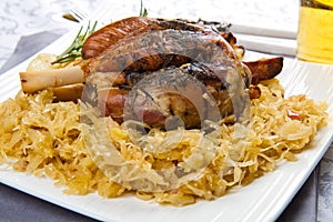 Pork knuckle baked with sauerkraut