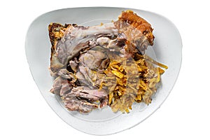 Pork leg eisbein with braised cabbage. Isolated, white background.