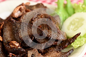 Pork liver with garlic and pepper.