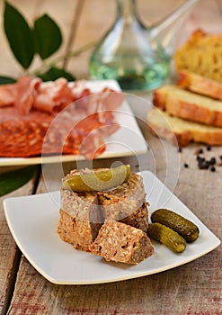 Pork liver paste pÃ¢tÃ© with pickles and tapas