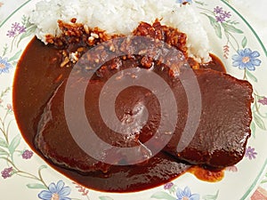 Pork Loins Smothered in Chili Sauce Served With White Rice