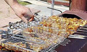 Pork meat being cooked on open fire