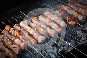 Pork meat kebab, souvlaki, cooked on a charcoal barbecue grill
