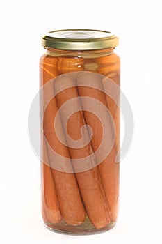 pork meat sausages in a jar