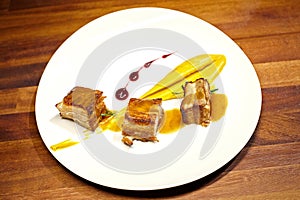 Pork meat with sweet potato puree and superfoods sauce.