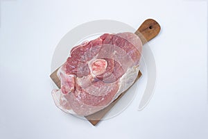 Pork meat on a white background. Raw pork leg.