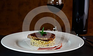 Pork medallion with risotto.