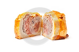 Pork pie isolated on a white studio background.