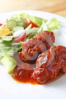 Pork rib with salad