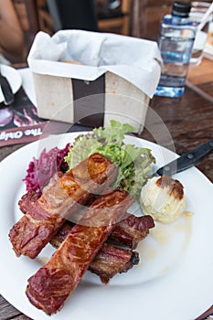 Pork ribs served with mashed potato