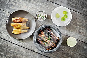 Pork ribs with thick fries coleslaw and garlic mayonnaise