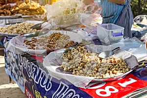 Pork rind on the tray at the outdoor food market in north Thailand