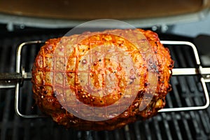 A pork roast on a spit