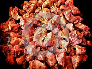 Pork roasted meat close up, pork greaves