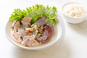 pork\'s entrails and blood jelly soup with rice photo