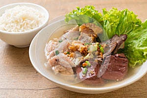 pork\'s entrails and blood jelly soup with rice photo