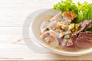 pork\'s entrails and blood jelly soup with rice photo