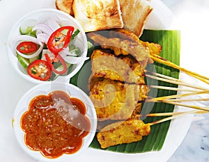 Pork satay, grilled pork served with peanut sauce or sweet and s