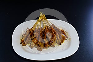 Pork Satay top with mala spicy hot food skewered and grilled meat, served with a peanut sauce. Top view copyspace
