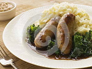 Pork Sausage and Mash with Curly Kale