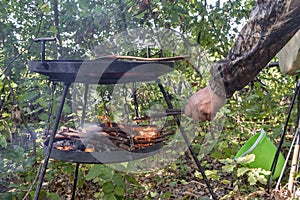 Pork sausages cooked fast on a campfire in nature