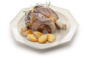 Pork shank with roasted potatoes, italian cuisine