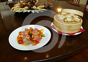 Pork slices and Chinese dumpling lie in basket