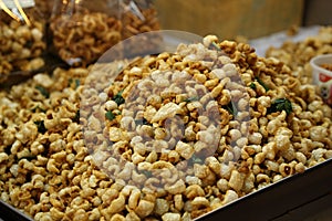 Pork snack, pork rind, pork scratching or pork crackling (Thai s