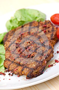 Pork steak,grilled with salad