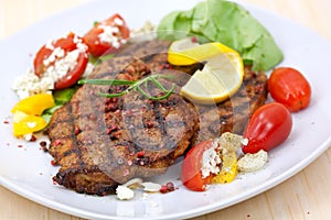 Pork steak,grilled with salad