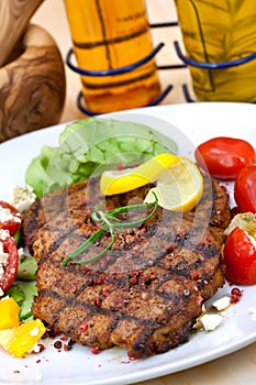 Pork steak,grilled with salad