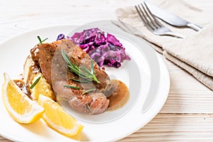 pork steak with red cabbage and mashed potatoes