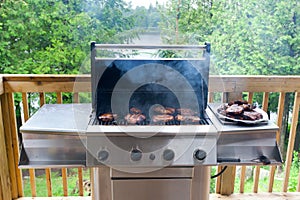 Pork steaks on gas grill